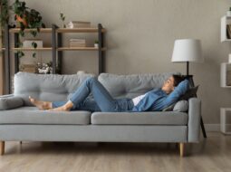 Side,View,Woman,Enjoy,Day,Nap,On,Comfy,Sofa.,Young