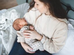 Crying,Baby,Girl,On,Mother,Hands,With,Colic,Stomach,Ache